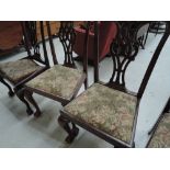Three period style mahogany dining chairs