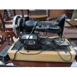 A vintage Singer electric sewing machine