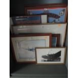 A selection of military and aviation related prints and decorations