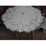 A plaster ceiling rose