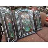 A stained glass fire screen