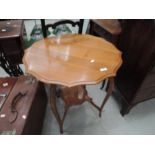A bleached mahogany occasional table