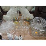 A selection of clear cut an colour glass wares