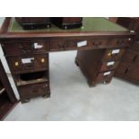 A reproduction Regency style mahogany pedestal desk