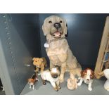 A selection of figures and figurines including cats and Sylvac dog