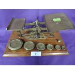 A set of brass cast post office letter scales and weight set