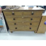 A Victorian stripped chest of two over three drawers