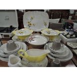 A part dinner service by Meaking in a yellow design