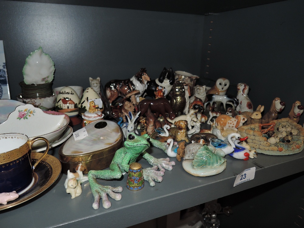 A selection of figures and figurines including Wade style