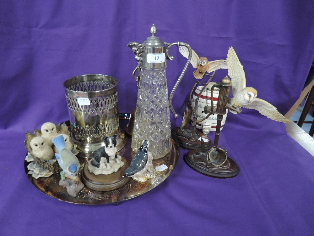 A selection of plated wares including claret jug