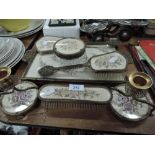 A dressing table set with embroidered design