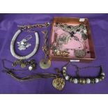 A selection of costume jewellery necklaces including coconut, beaded etc