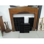 A 1930s oak fire surround