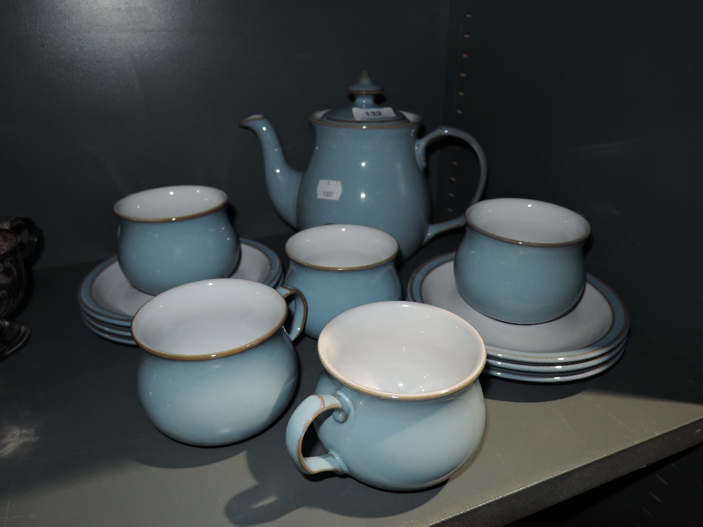 A tea service by Denby in powder blue