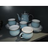 A tea service by Denby in powder blue