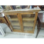 A stripped pine bookcase/dresser top