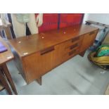 A mid century teak sideboard, possibly Scandinavian