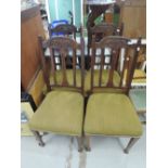 A set of four Art Nouveau mahogany dining chairs