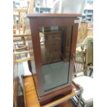 A modern mahogany effect mini hifi cabinet