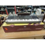 A vintage Casio keyboard, Casiotone MT-210 with original box