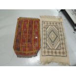 Two fire side or hall way rugs
