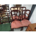 A set of four late 20th Century mahogany dining chairs