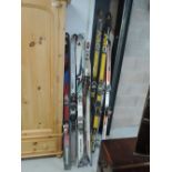 A selection of vintage skis and poles