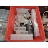 A large box of jewellery crafter's clasps, fittings, chains, beads, cases, etc