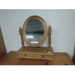 A modern pine dressing table mirror