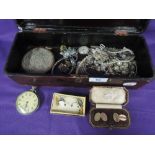 A papier mache glove box containing a selection of vintage costume jewellery including gold plated