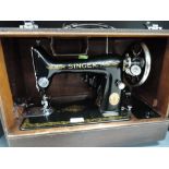 A hand cranked Singer sewing machine no ED872864