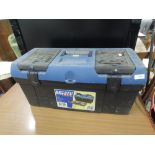 A tough plastic tool box and contents