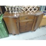 A mid 20th Century oak sideboard