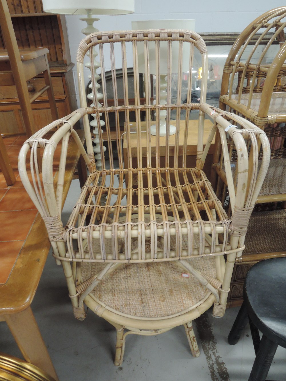 A canework chair and coffee table