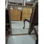 A modern gilt framed mirror