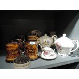 A selection of ceramics including musical teapot