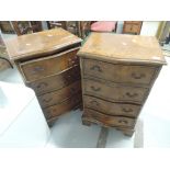 A pair of mid to late 20th Century period style bedside chests of 4 serpentine drawers