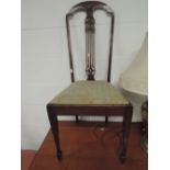 An early 20th Century mahogany bedroom chair