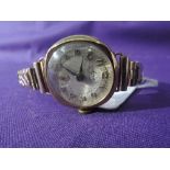 A lady's 9ct gold vintage wrist watch by Avia having an Arabic numeral dial with subsidiary