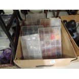 A bag containing four large cases and one small case of assorted jewellery crafters beads