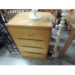 A plywood chest of 4 drawers