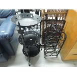 A selection of metal work items including wine rack and fireguard