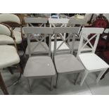 A set of six painted solid seat dining chairs