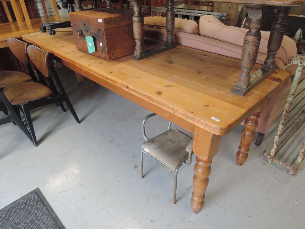 A modern pine banquet style table