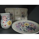 A selection of ceramics by Poole pottery