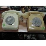 Two plastic bodied telephone sets