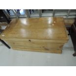 A Victorian stripped pine bedding or tool chest