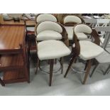 A set of four vintage walnut effect, chrome and leatherette bar stools