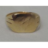 A yellow metal signet ring of plain square form, no marks, tested as 9ct gold