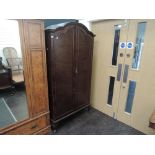 A mid/late 20th century mahogany Queen Anne style wardrobe having arch top and cabriole legs